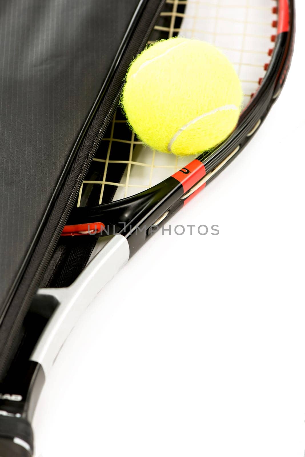 tennis racquet and ball on a white background