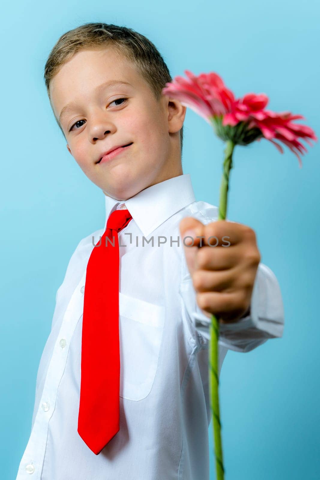 first grader with a backpack holds a bouquet of flowers by audiznam2609