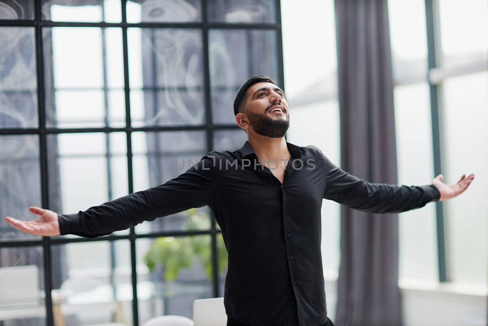 Achievement career wealth business concept. Mock up copy space. Clenching fists like winner.