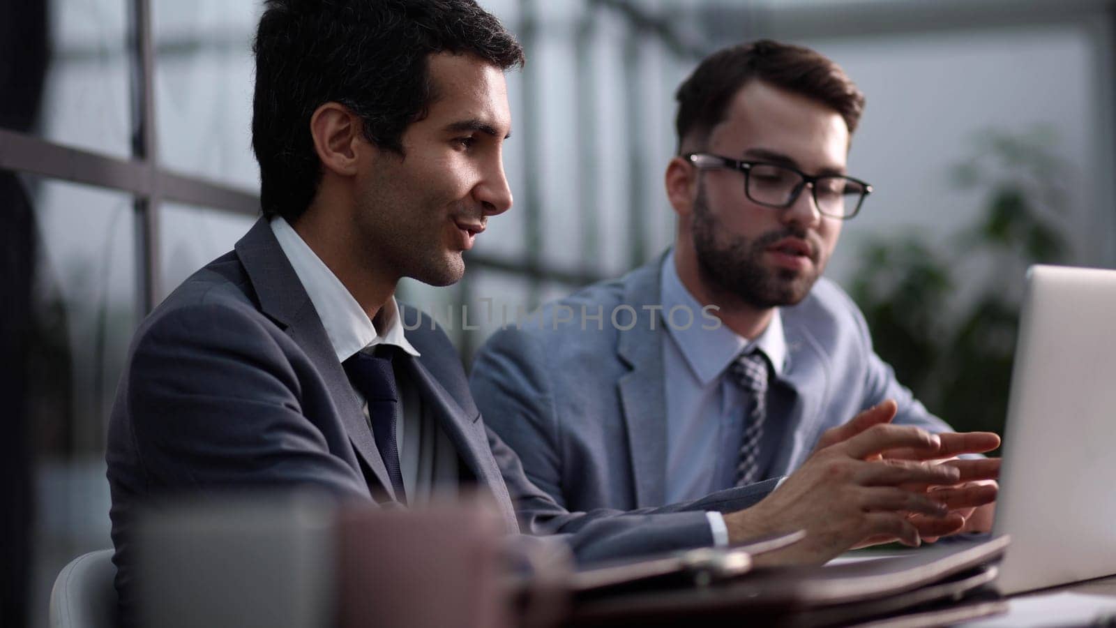 View Of Traders Office Working Sitting At Desk