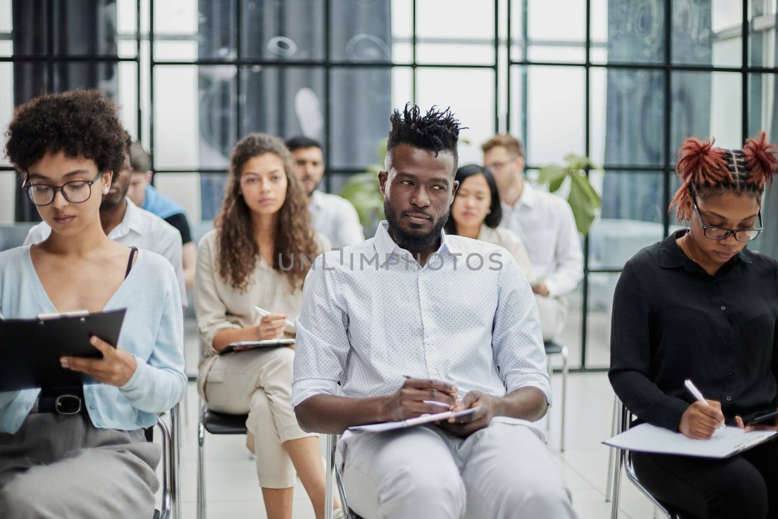 Business People Having Discussion In Conference Room