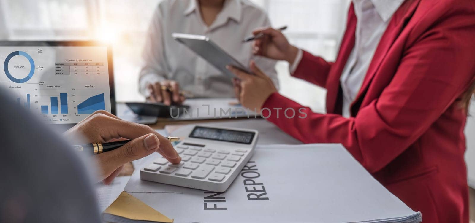 Business People Meeting using laptop computer,calculator,notebook,stock market chart paper for analysis Plans to improve quality next month. Conference Discussion Corporate Concept