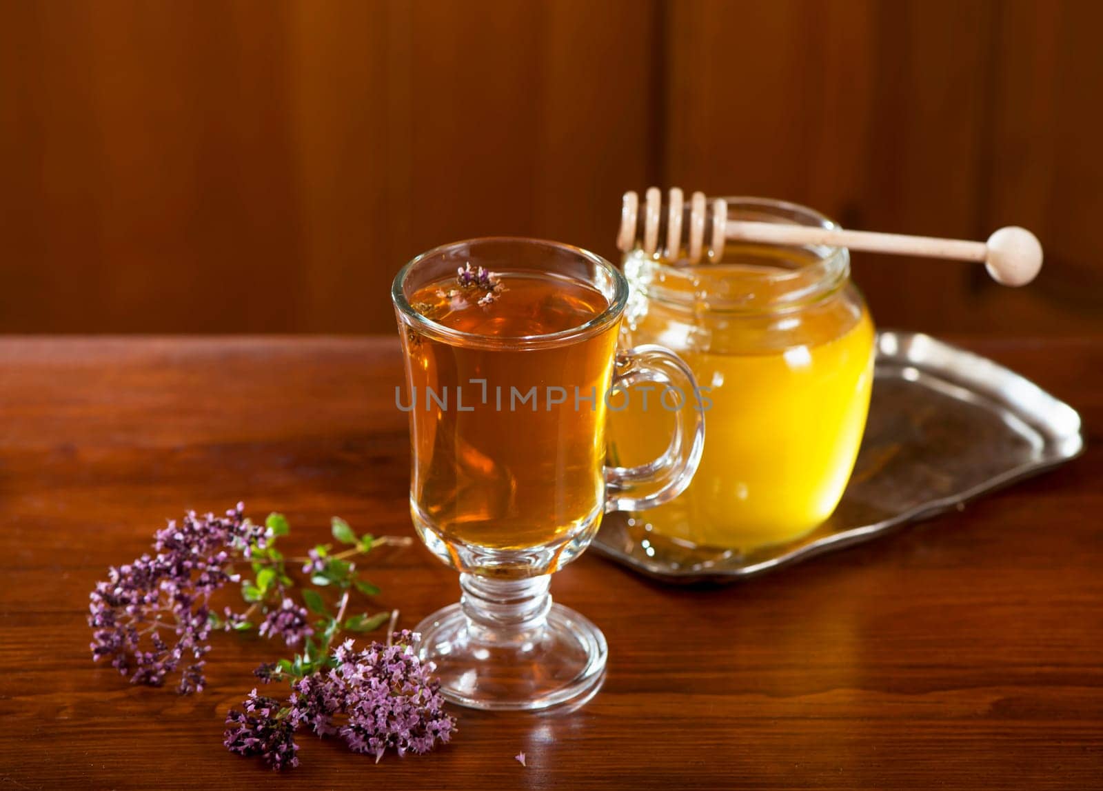 Still life from medicinal herbs, honey, herbal tea by aprilphoto