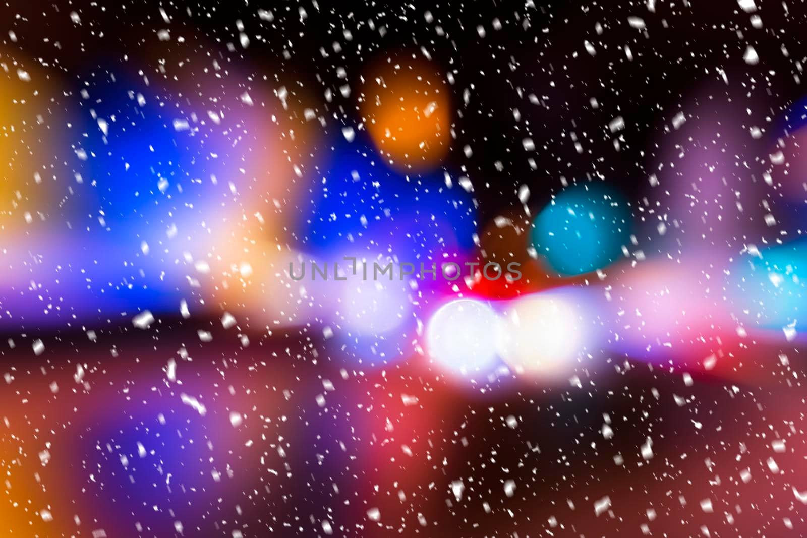 Blurred lights of headlights of cars and lanterns in the night city in a snowfall. Abstract bokeh. by Eugene_Yemelyanov