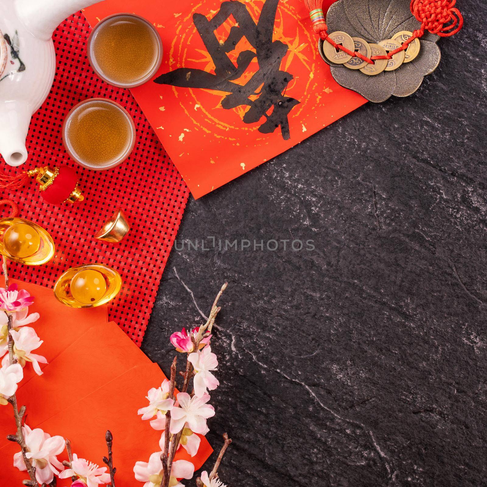 Design concept of Chinese lunar January new year - Festive accessories, red envelopes (ang pow, hong bao), top view, flat lay, overhead above. The word 'chun' means coming spring.