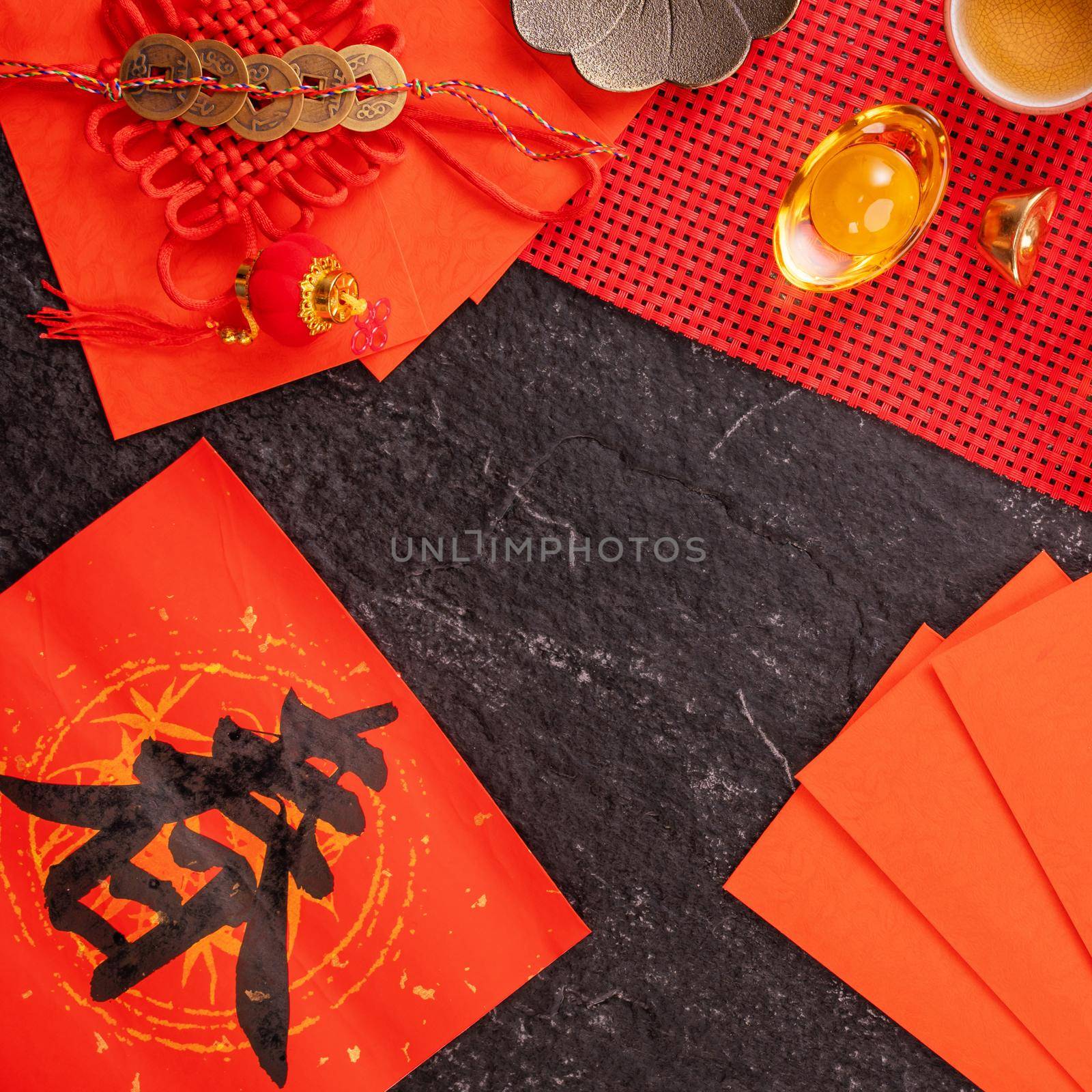 Design concept of Chinese lunar January new year - Festive accessories, red envelopes (ang pow, hong bao), top view, flat lay, overhead above. The word 'chun' means coming spring.