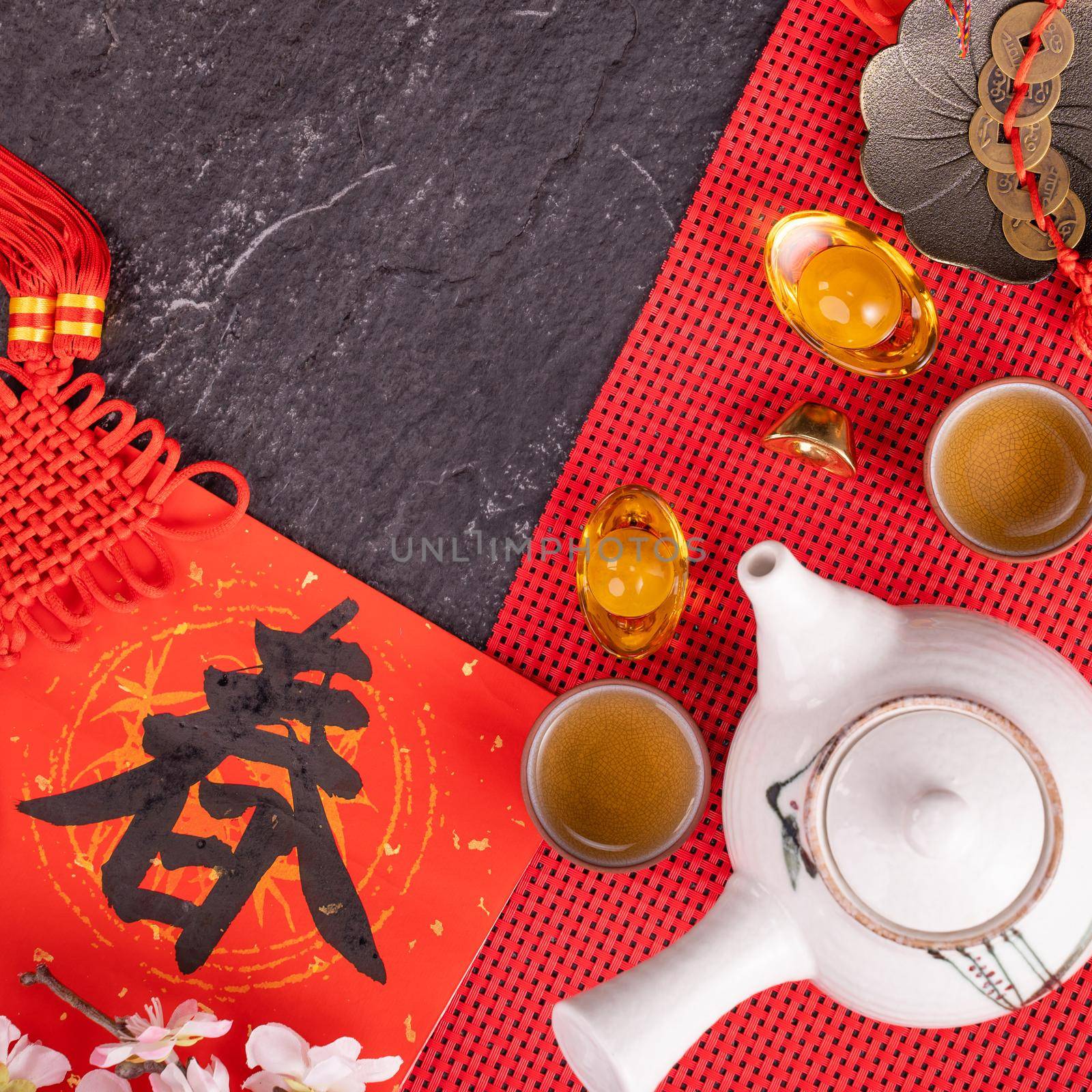 Design concept of Chinese lunar January new year - Festive accessories, red envelopes (ang pow, hong bao), top view, flat lay, overhead above. The word 'chun' means coming spring.