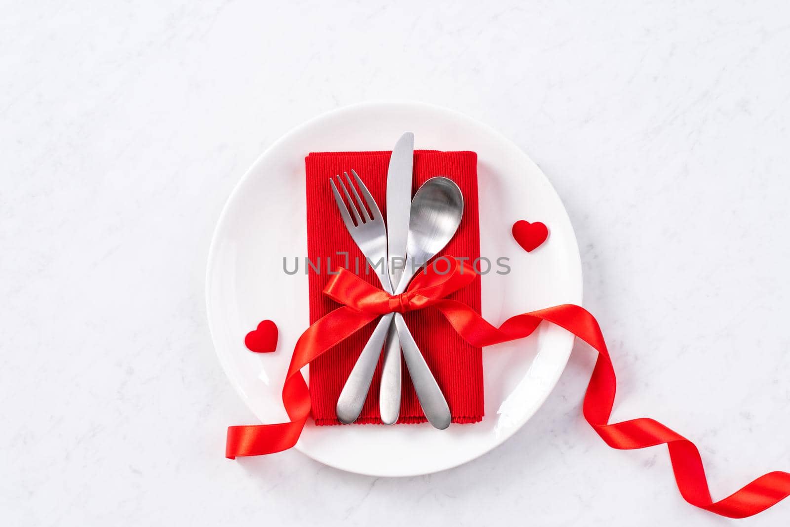 Valentine's Day meal design concept - Romantic plate dish set isolated on marble white background for restaurant holiday celebration promo, top view, flat lay. by ROMIXIMAGE