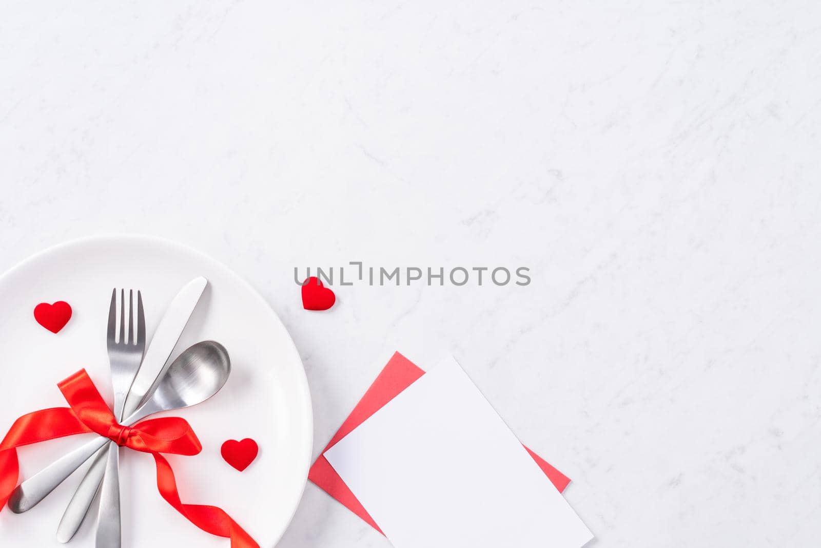 Valentine's Day meal design concept - Romantic plate dish set isolated on marble white background for restaurant holiday celebration promo, top view, flat lay. by ROMIXIMAGE