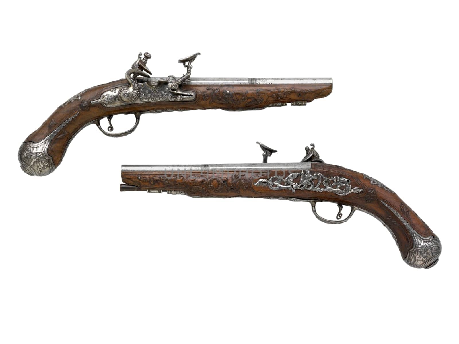 antique, vintage handguns from the 17th century. isolated background