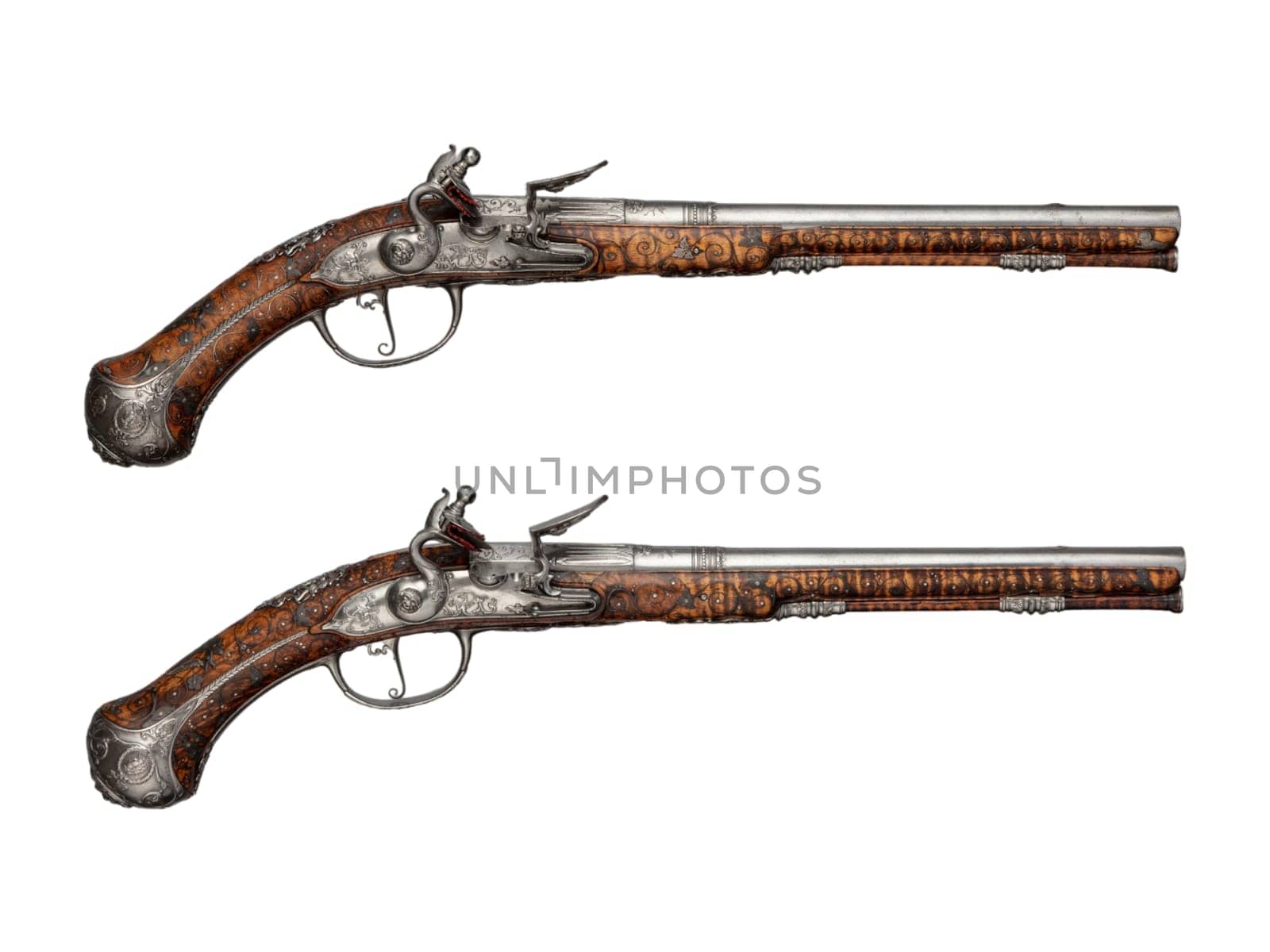 antique vintage handguns isolated background by gallofoto