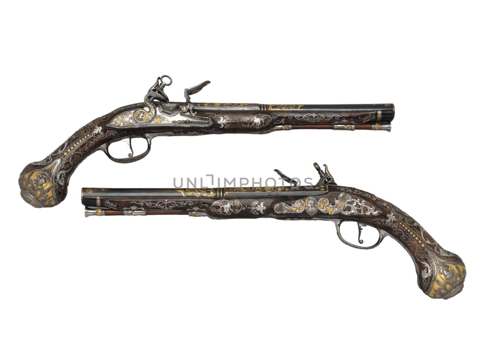 antique, vintage handguns from the 17th century. isolated background