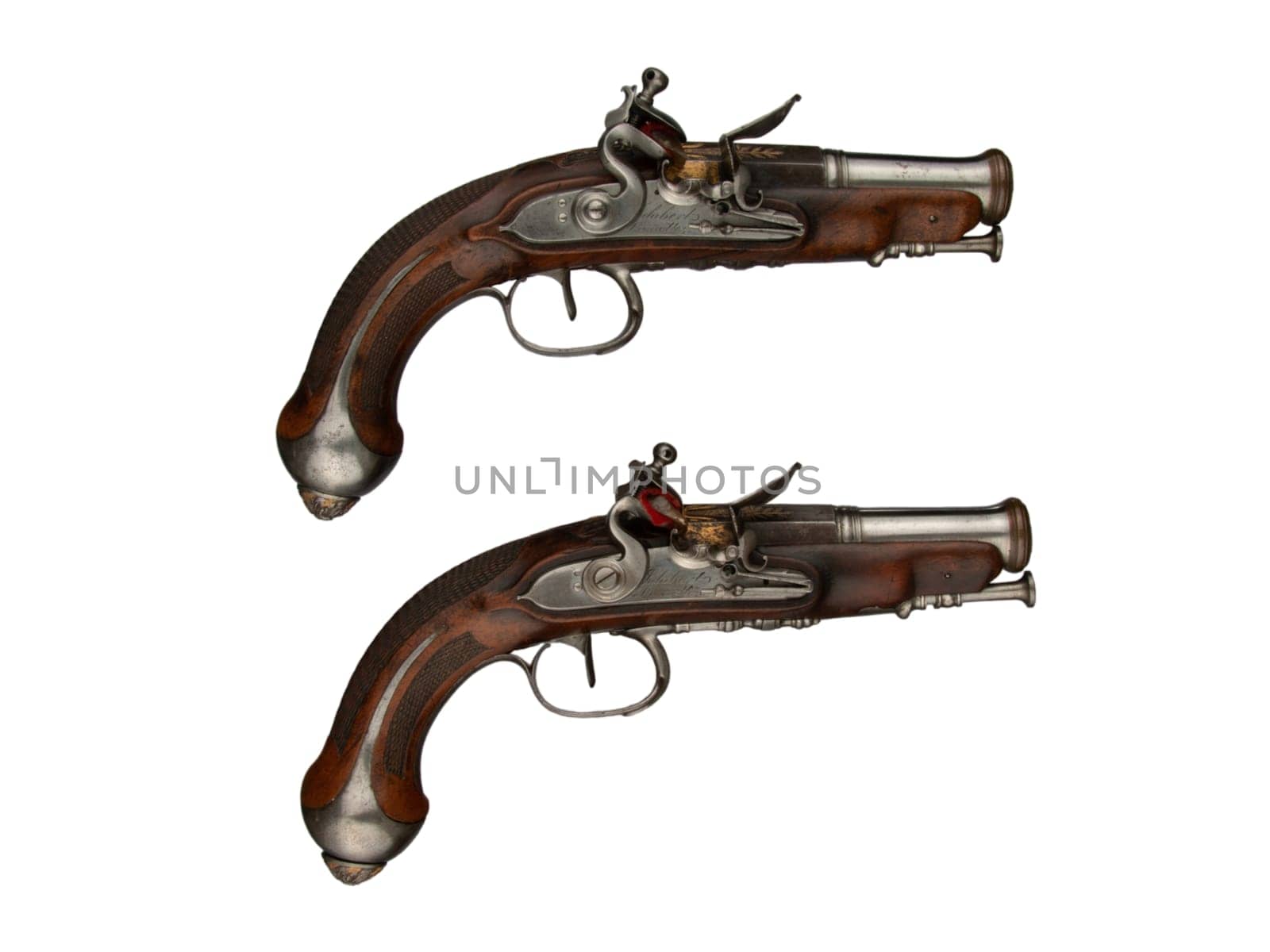 antique vintage handguns isolated background by gallofoto