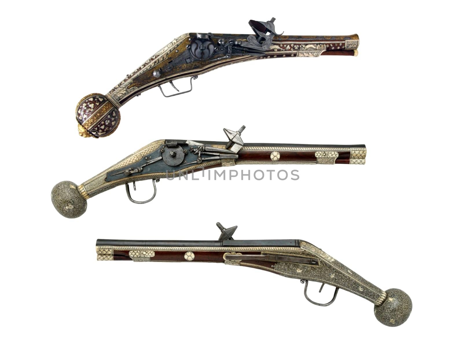 antique, vintage handguns from the 17th century. isolated background