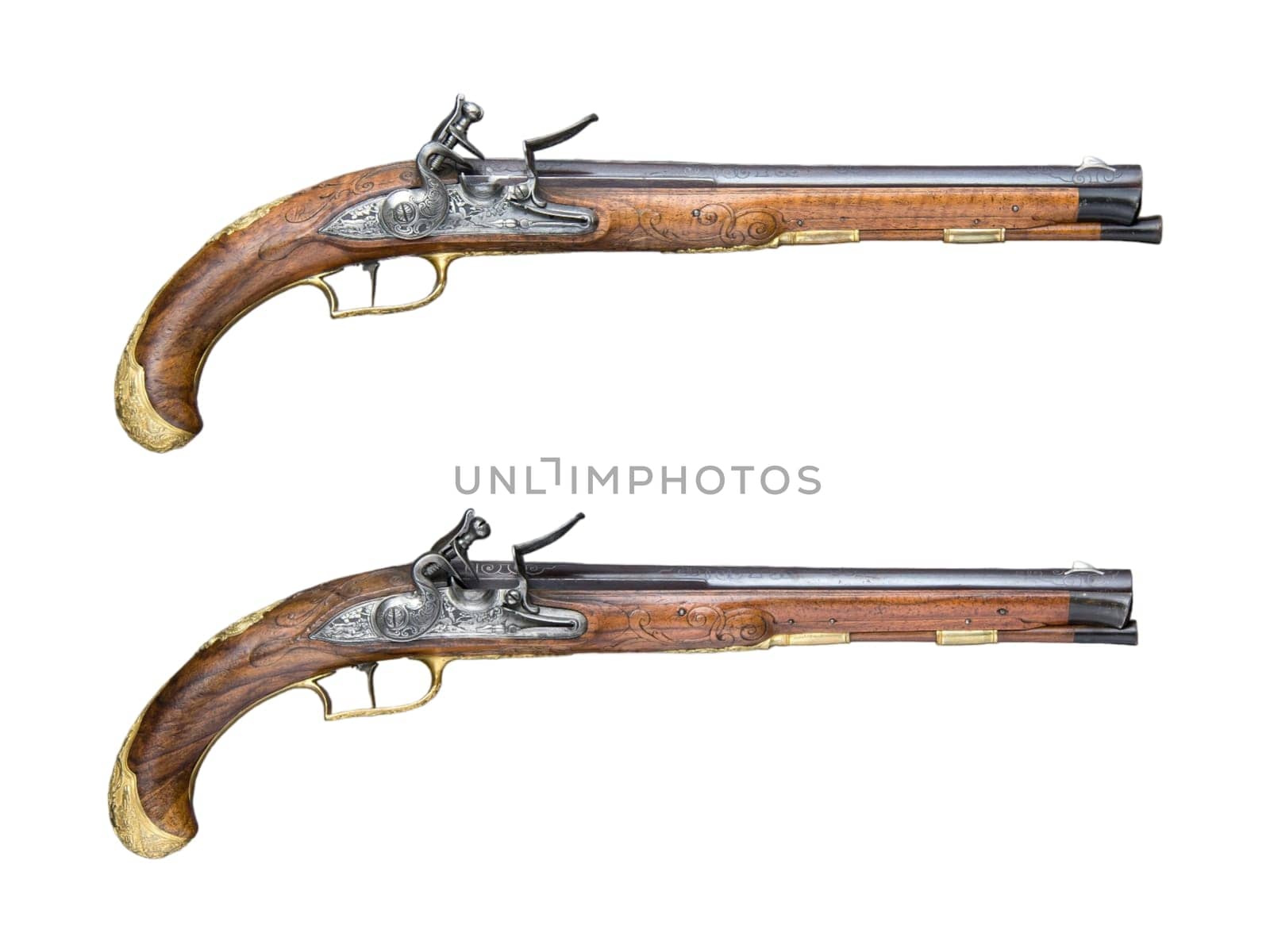 antique, vintage handguns from the 17th century. isolated background