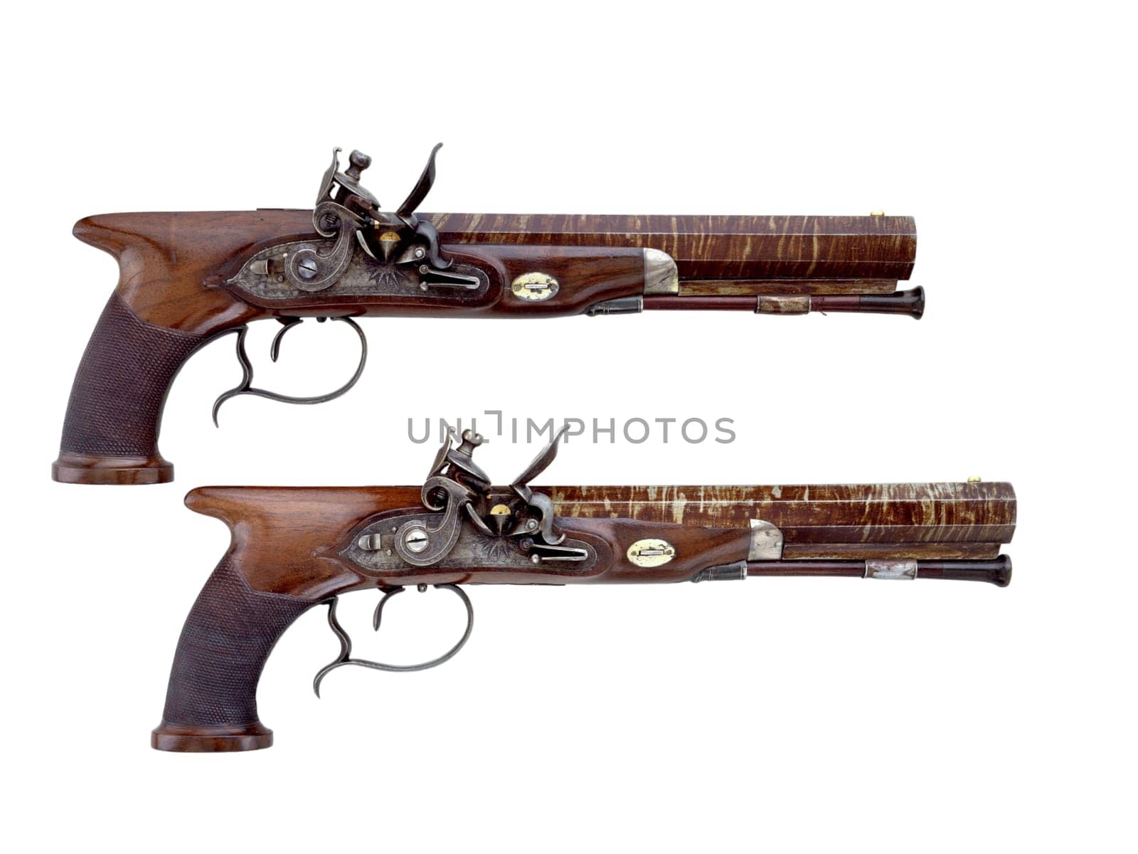 antique, vintage handguns from the 17th century. isolated background