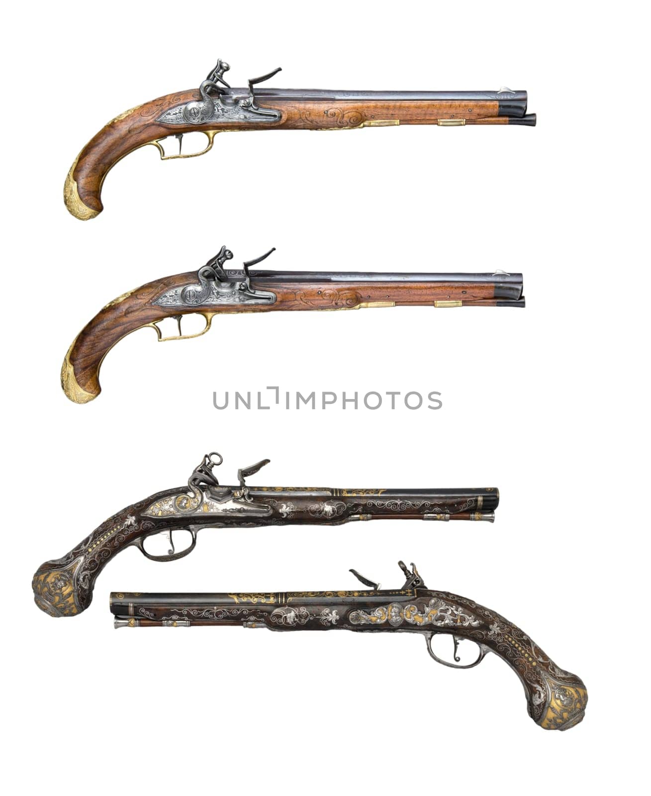 antique, vintage handguns from the 17th century. isolated background