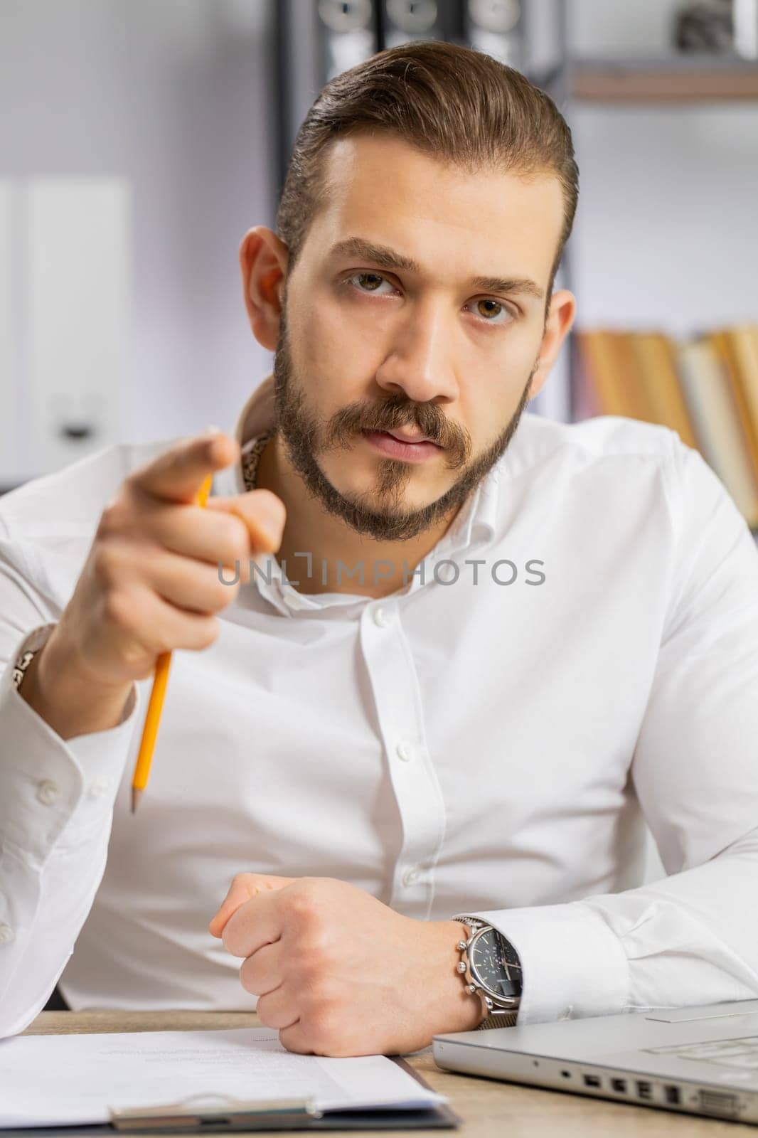 Conflict Quarrel Negotiation. Angry boss business man making online video call, talking colleague conversation analyzing financial report mistake problem. Guy at office looking at camera. Vertical