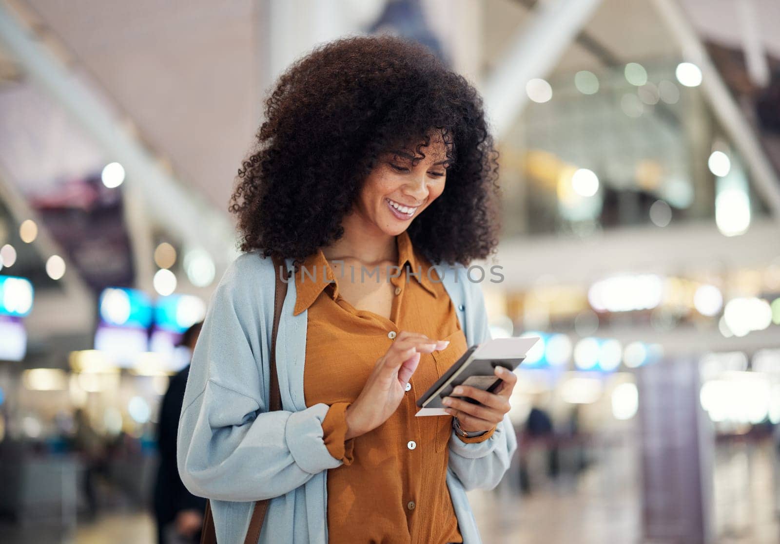 Black woman at airport, travel and passport with smartphone, excited for holiday and plane ticket with communication. Freedom, chat or scroll social media, flight with transportation and vacation.
