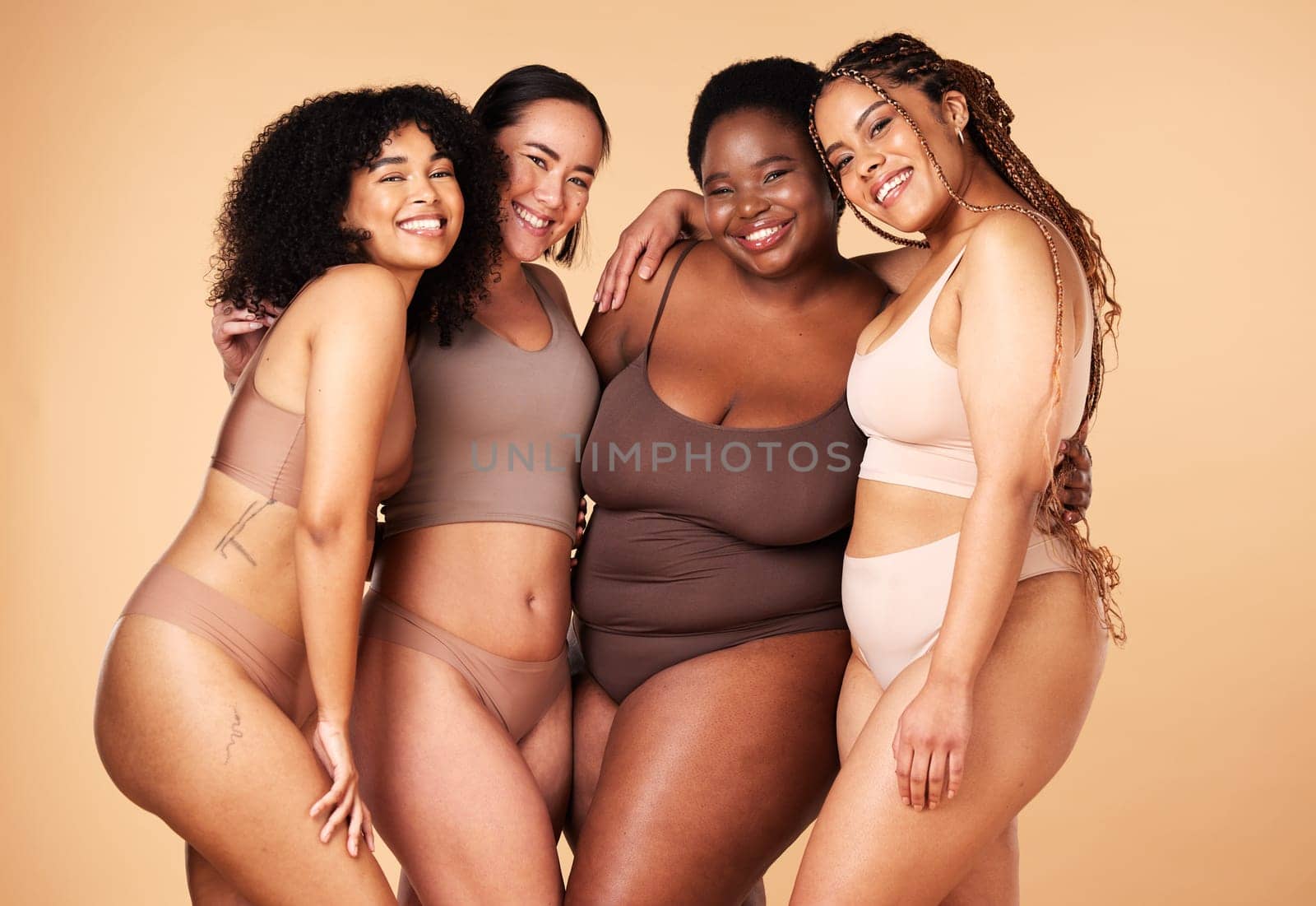 Diversity, body positive and portrait of women group together for inclusion, beauty and power. Aesthetic model people or friends on beige background with skin glow, pride and motivation for self love.