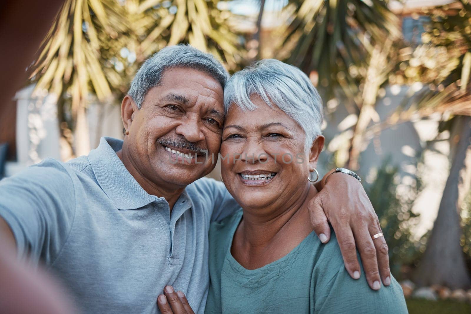 Senior couple, hug and smile for selfie, social media or profile picture together for romance in the back yard. Portrait of happy elderly man and woman smiling in happiness for photo or relationship.