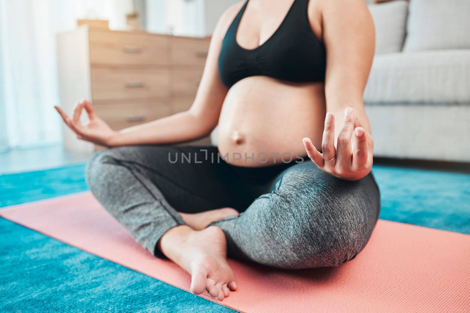 Yoga, pregnant and woman with meditation, lotus pose and peace, zen and calm with mindfulness, exercise for prenatal health. Self care, wellness and pregnancy fitness, pregnant woman and balance. by YuriArcurs