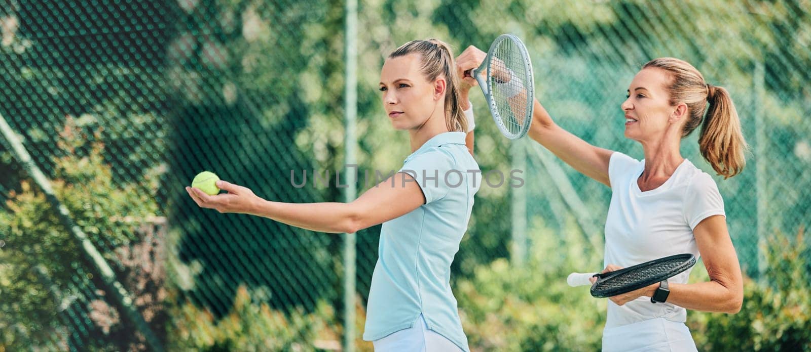 Tennis training, sport and women together on outdoor turf, instructor or coach with fitness, motivation and help. Exercise, sports lesson and athlete workout, teaching and learning skill on court.