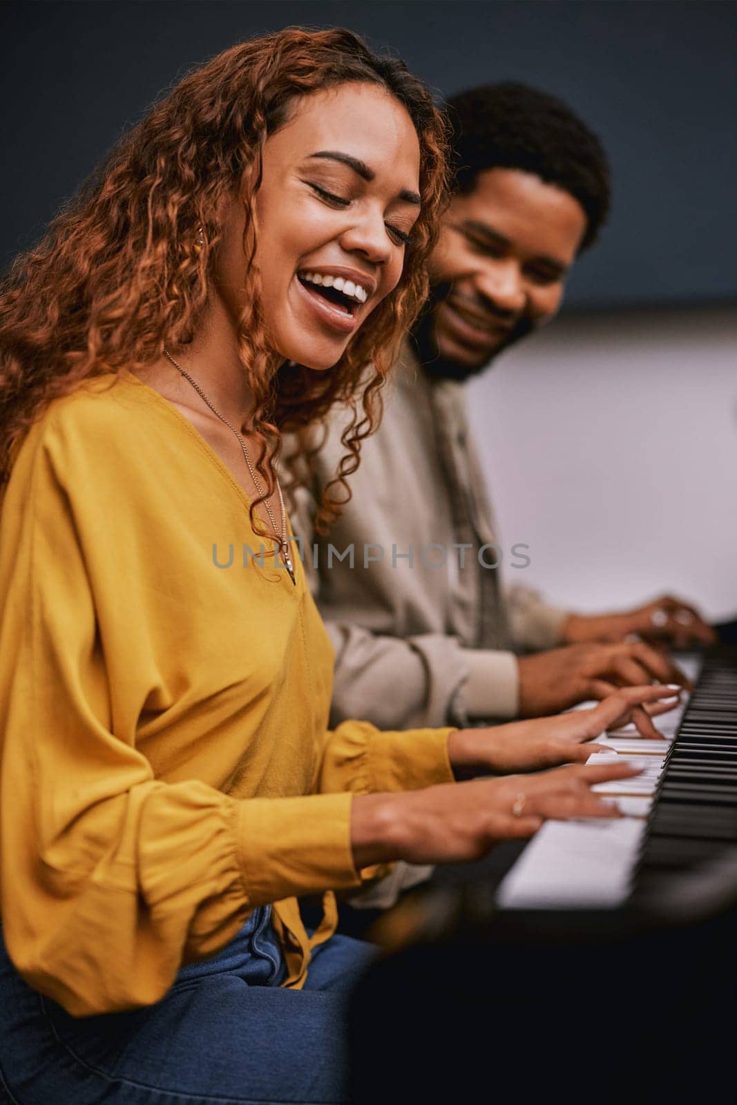 Friends, musicians and playing piano in studio album recording, night learning or education coaching for label industry. Smile, happy and singer woman with pianist instrument for radio collaboration by YuriArcurs