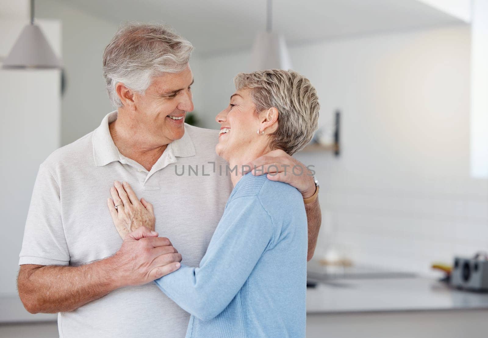 Love, senior couple and hug with smile, happy and bonding for relationship, romance and quality time. Romantic, mature man and elderly woman embrace for loving, relax and together in home or marriage.