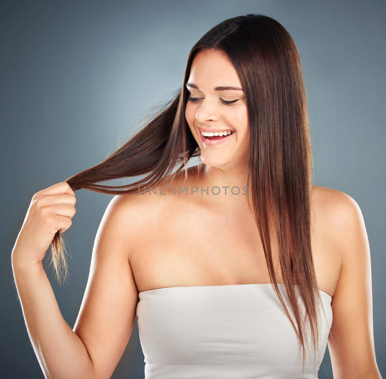 Hair care, woman and hair growth progress after keratin salon treatment with happiness. Smooth hairstyle texture of a model with extensions happy about wellness, health and hair color beauty shine by YuriArcurs