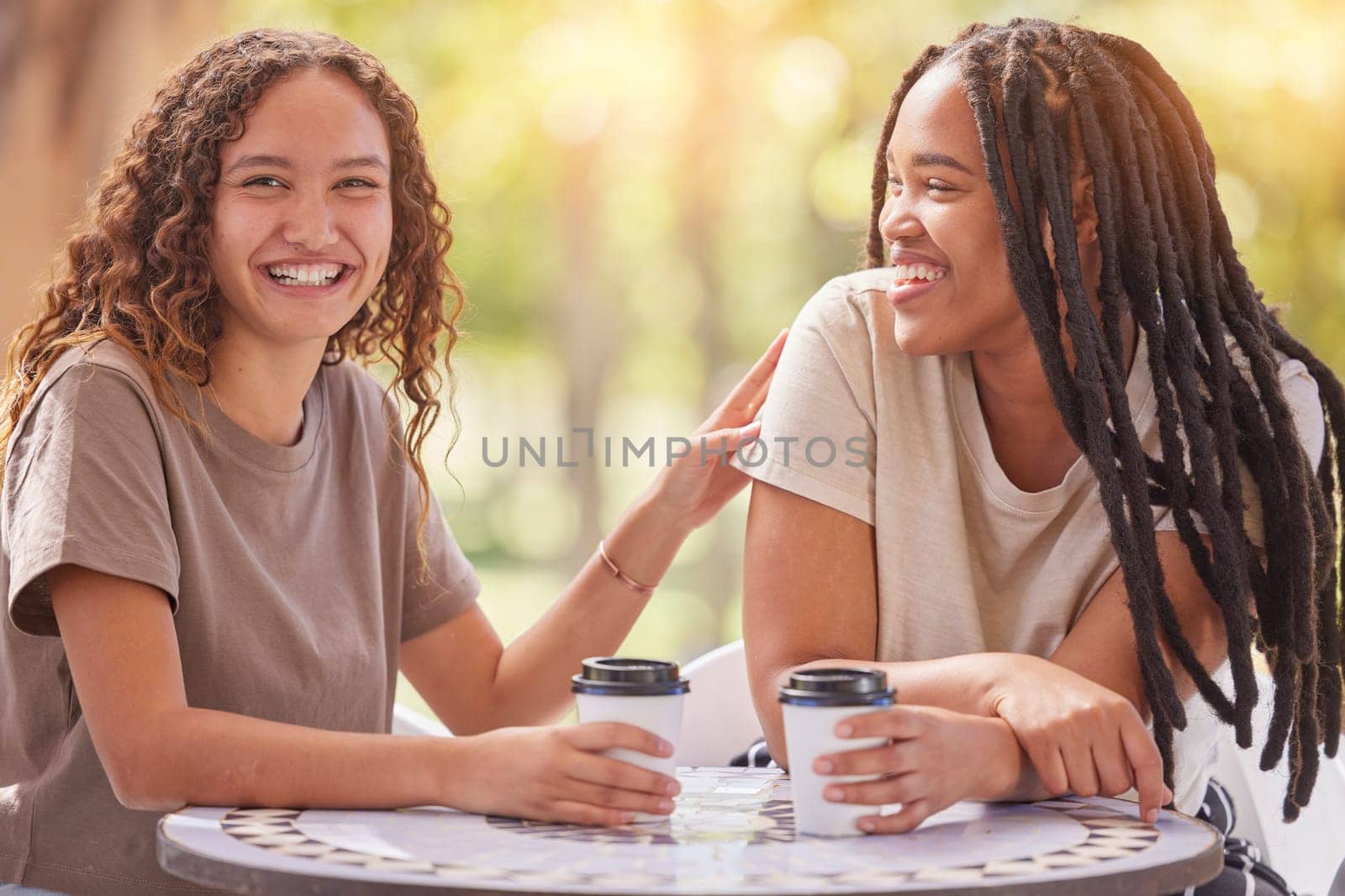Friends, coffee and women at cafe, smile and bonding for reunion, talking and chatting together. Sisterhood, females and ladies with tea, outdoor or conversation for happiness, communication or relax by YuriArcurs