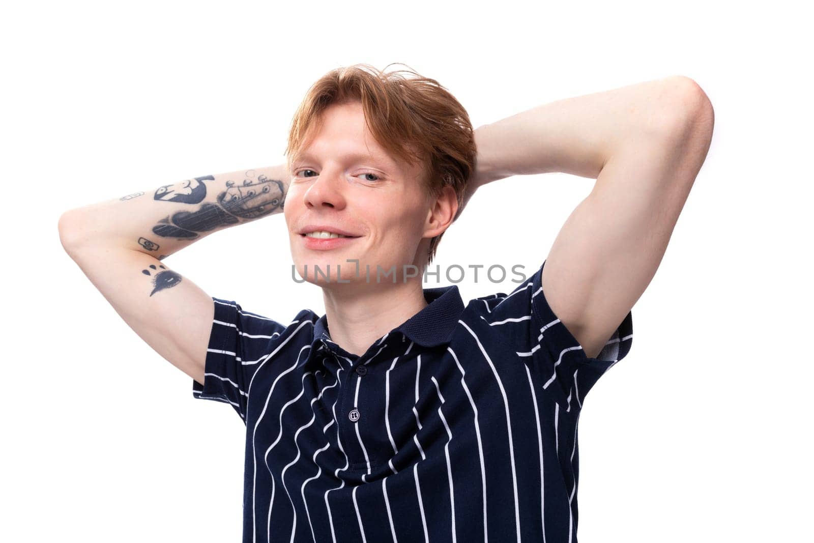 close-up portrait of a stylish handsome young blond man on a white background by TRMK