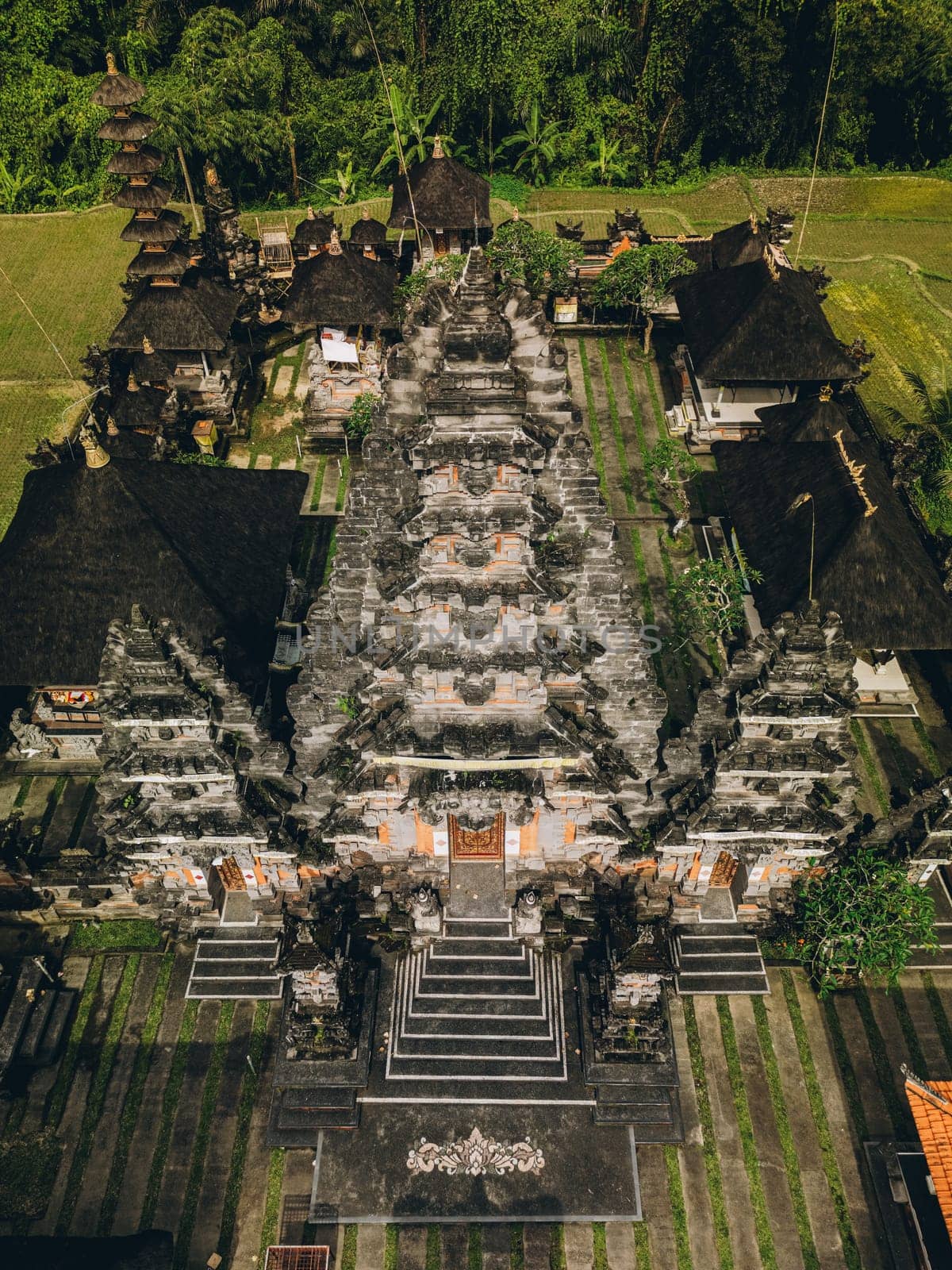 Aerial view of beautiful complex traditional Hinduism stone balinese temple. Holy asian pura architecture, Indonesia