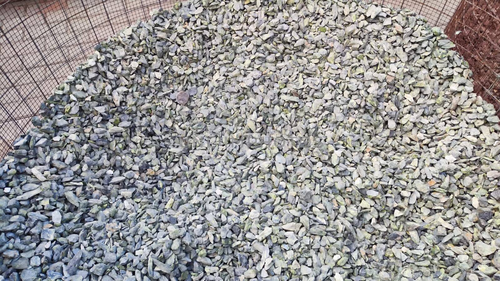 Gravel texture. Fine gray stone gravel. Natural textural background. Copy space, pattern
