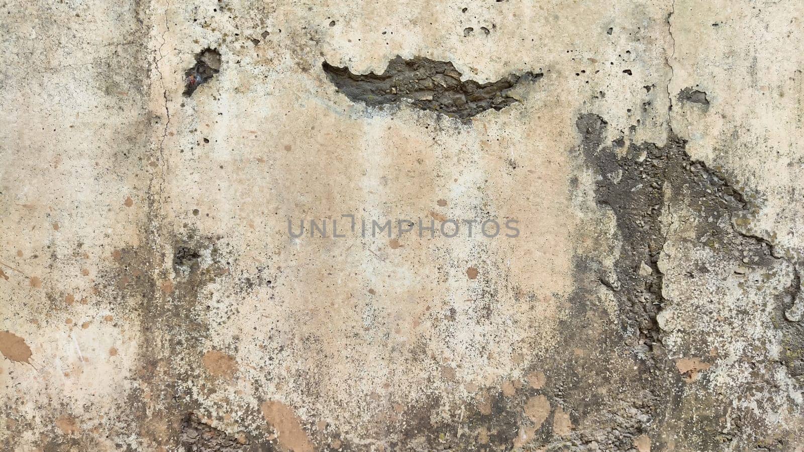 Abstract concrete gray background with dark uneven spots and rough texture. Frame and pattern, Copy space.
