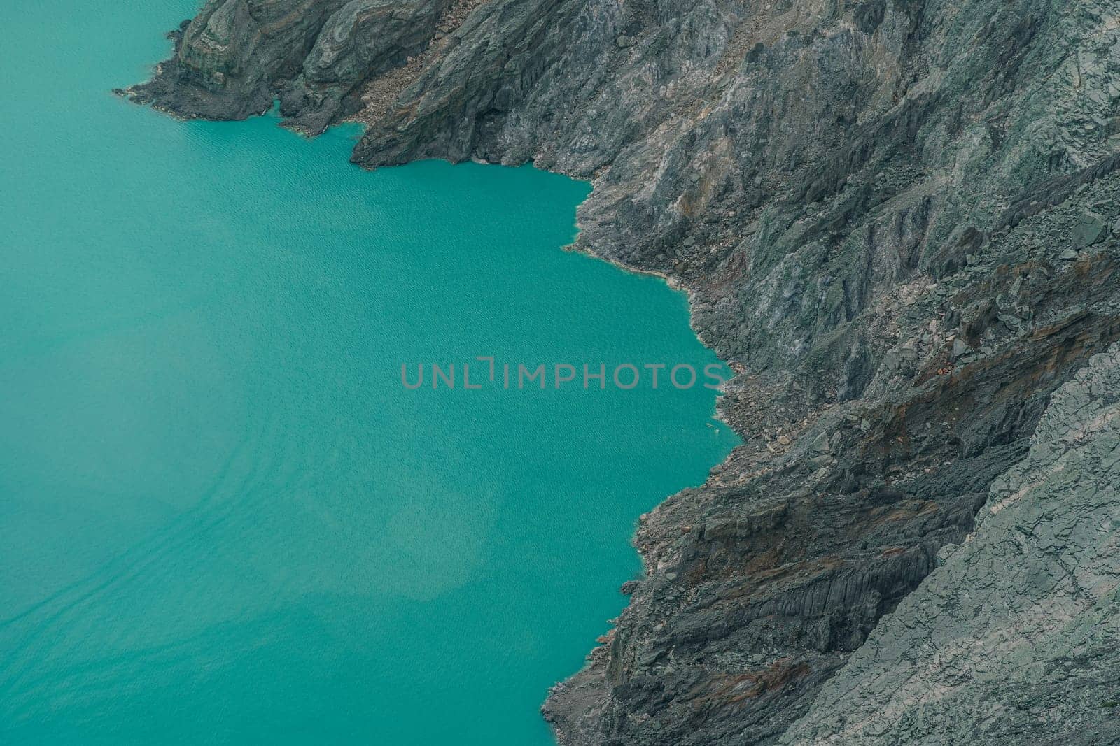 Top view of blue lake in the mountains by Popov