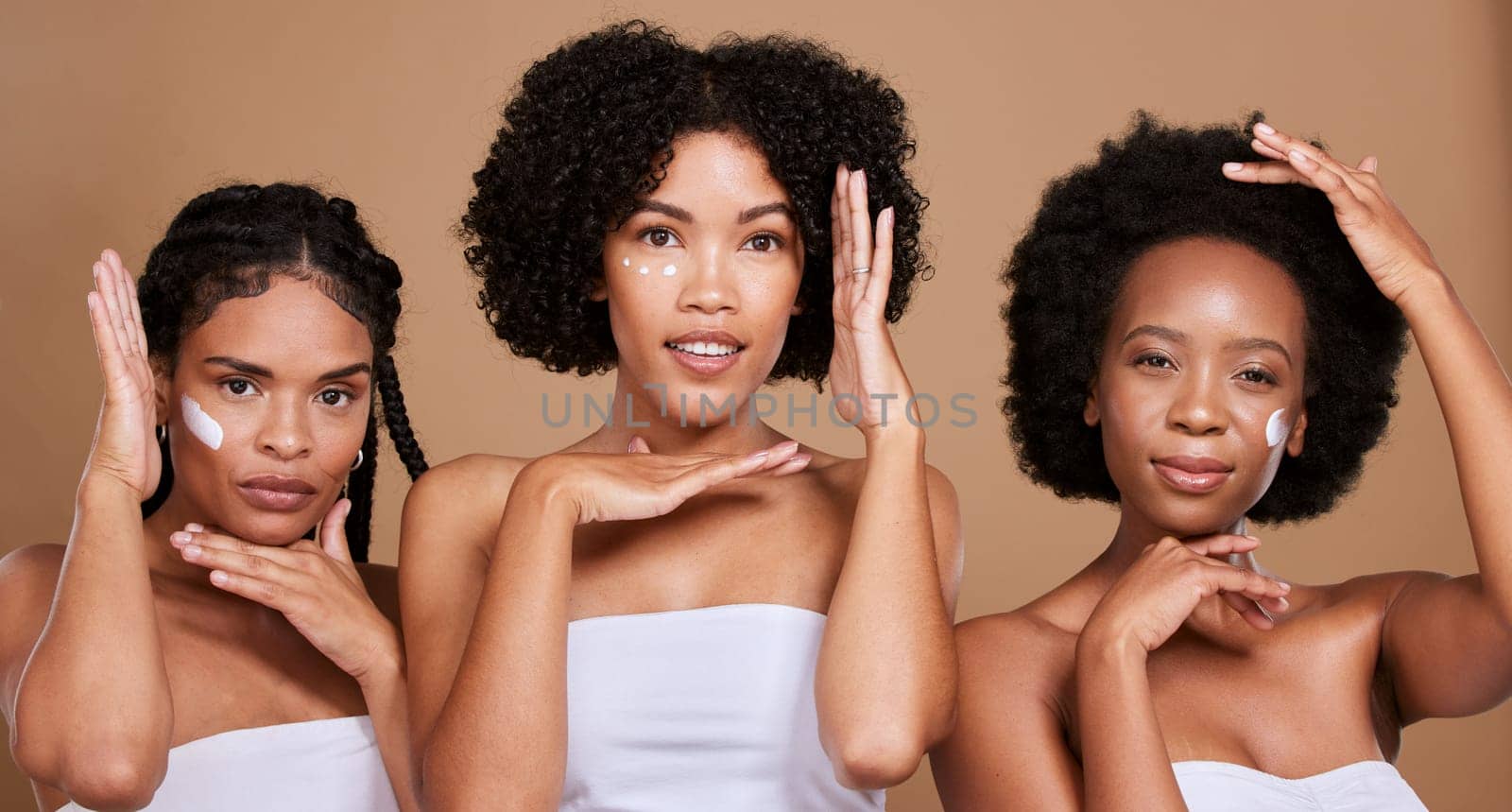 Black women, skincare cream and beauty group frame face, sunscreen makeup product and luxury facial treatment on studio background. Portrait of female black people, body lotion and natural cosmetics.