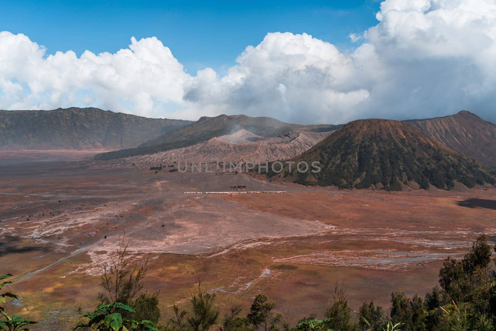 Landscape view of bromo volcano with cloudy sky by Popov