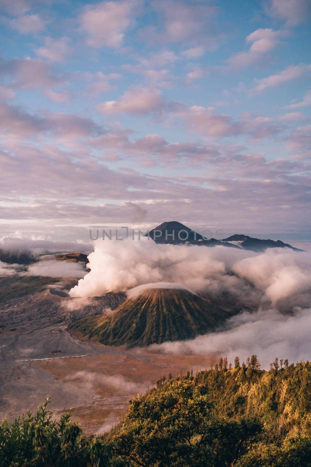 Landscape view of misty mount Bromo volcano by Popov