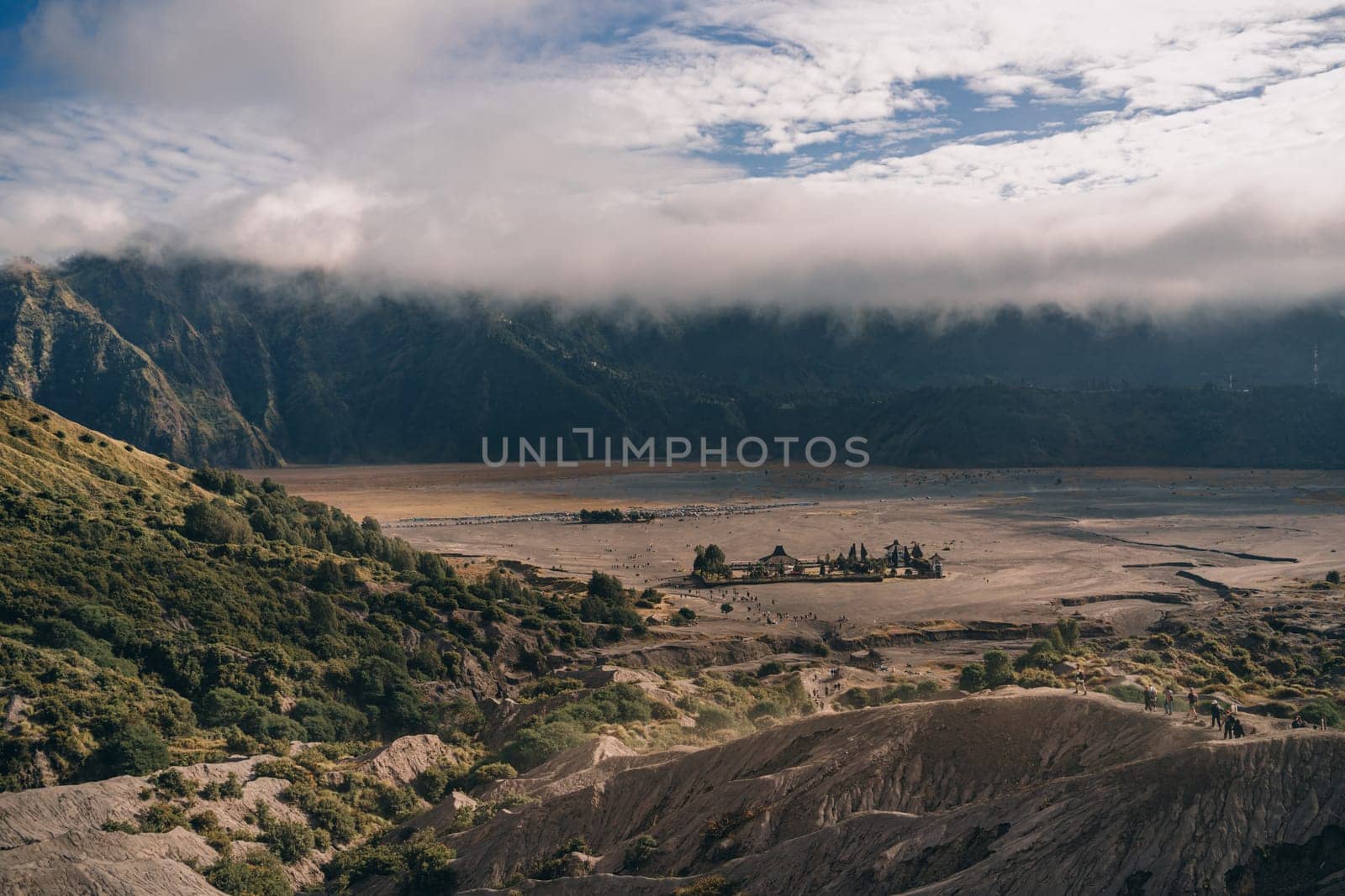 Majestic landscape view of foggy Mount Bromo volcano. Morning mist in Semeru National Park