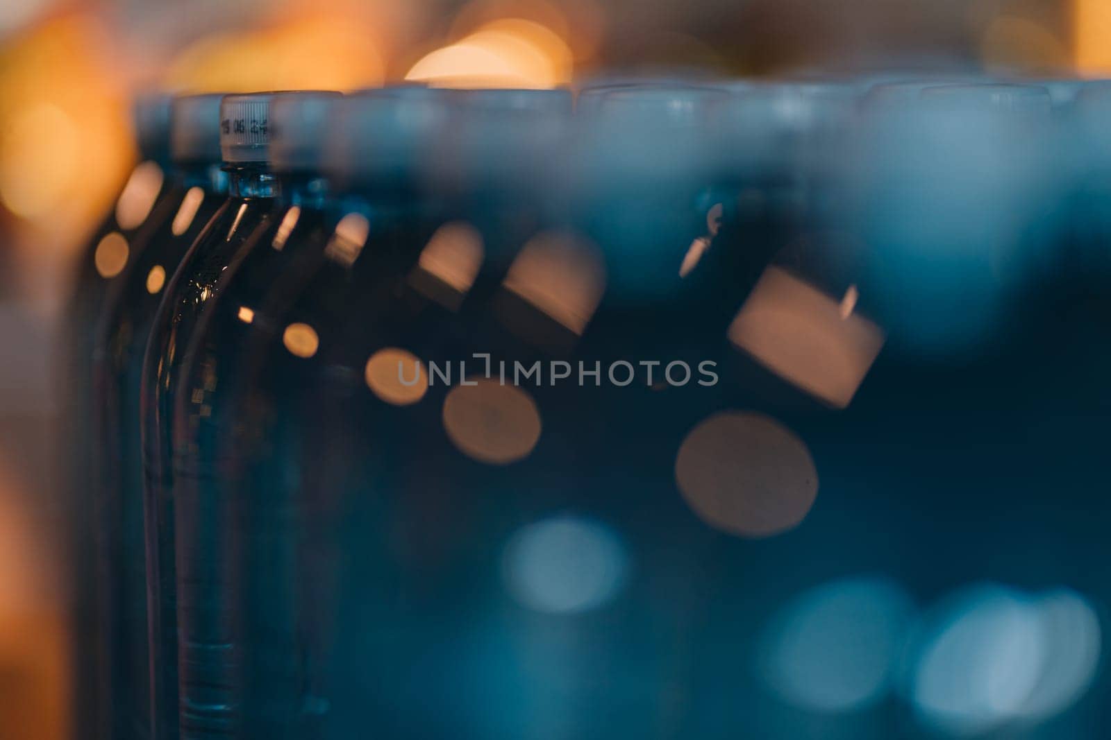 Close up shot of raw water plastics bottles by Popov
