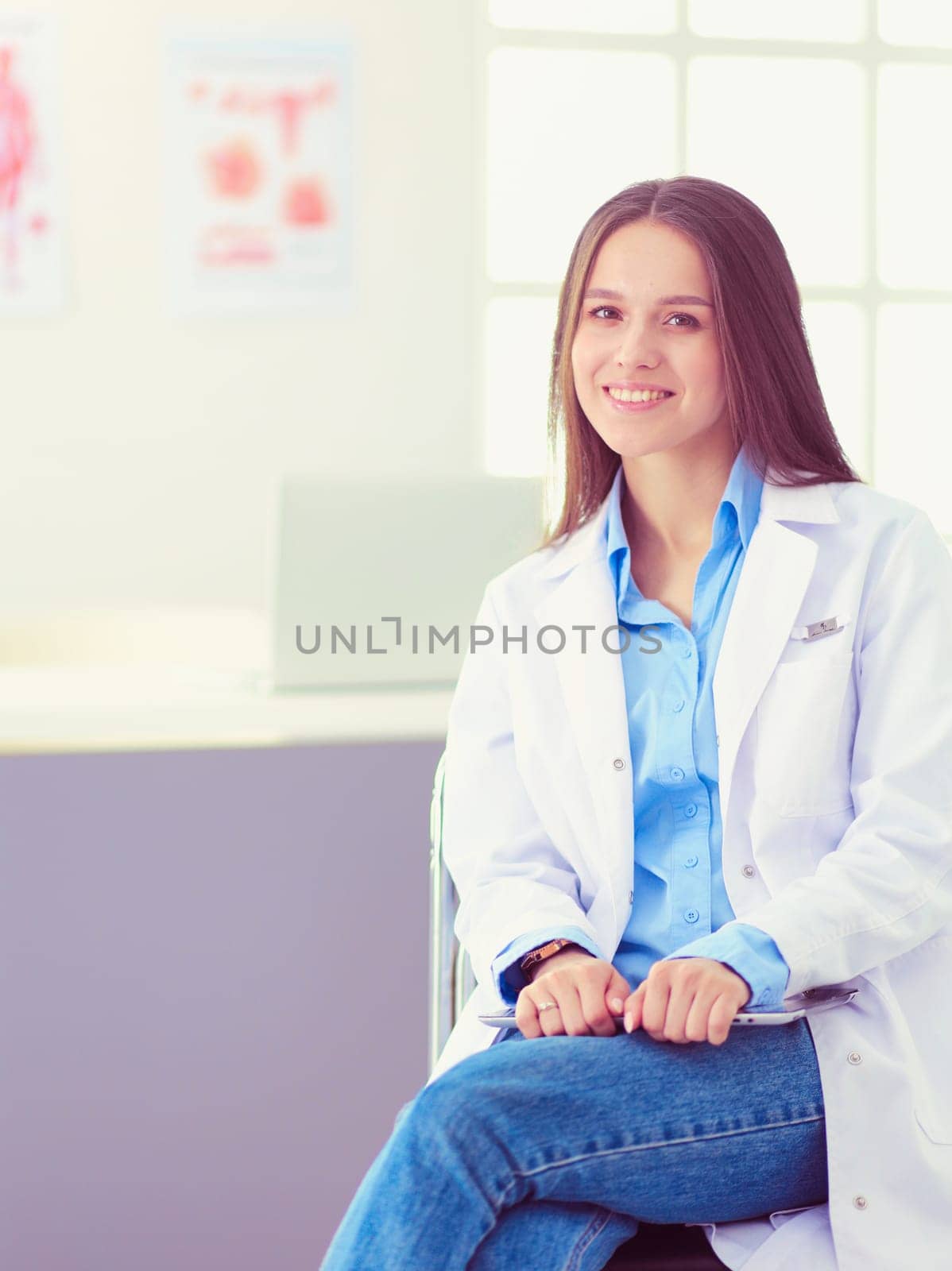 Doctor and patient discussing something while sitting at the table . Medicine and health care concept.