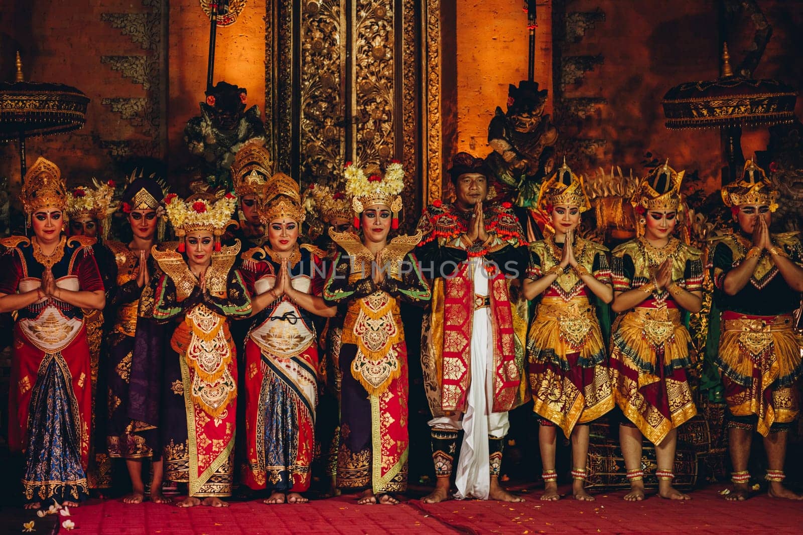 Balinese dance show with colorful dressed artists. Traditional balinese religious ritual performance