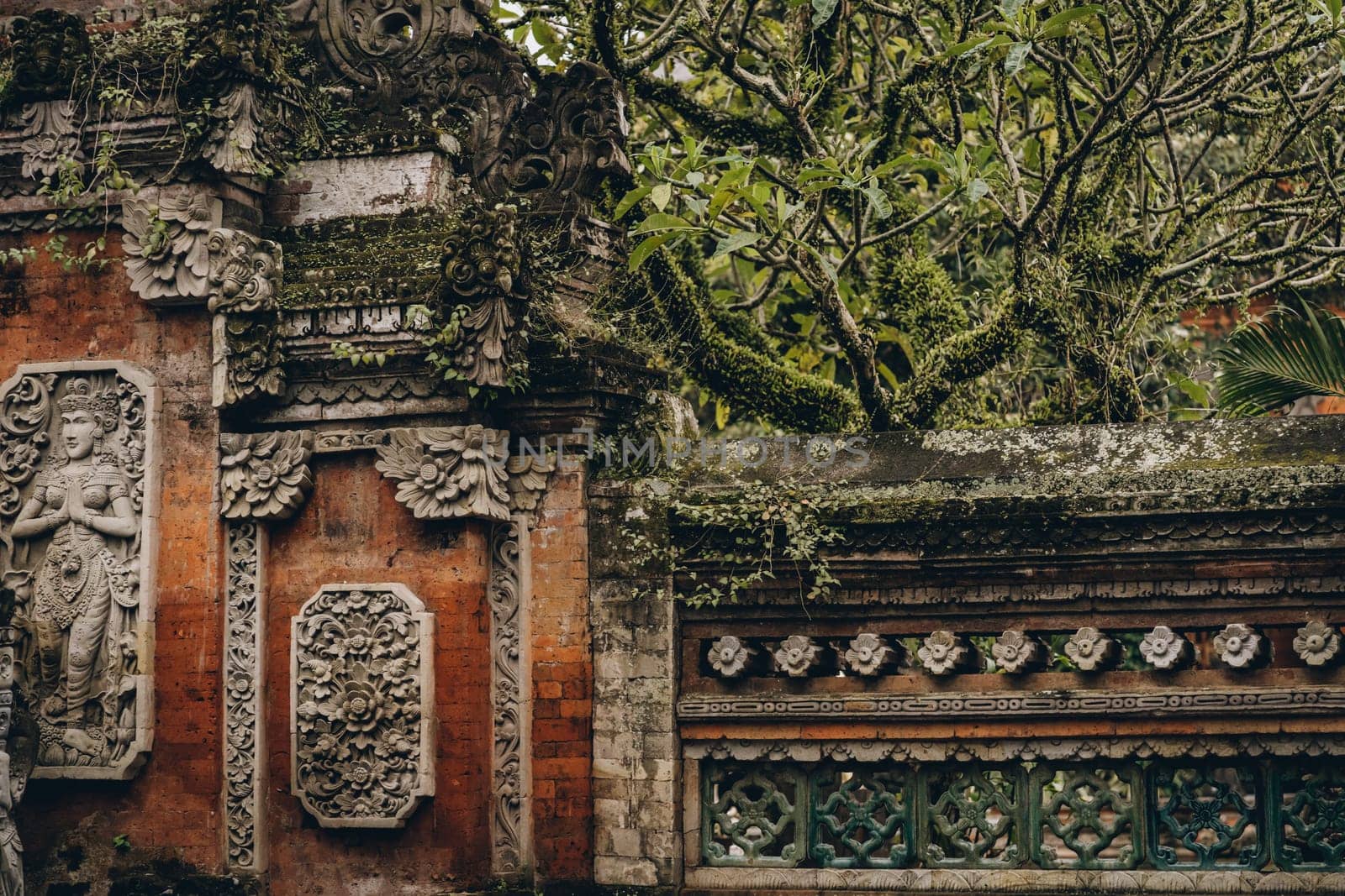 Close up shot of balinese wall and temple architecture. Traditional decorative religious building details