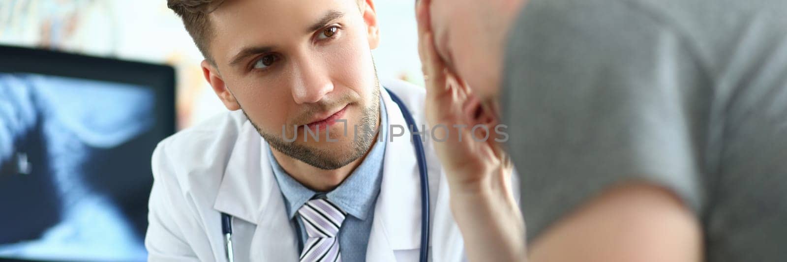 Doctor with tablet consults patient suffering from mental stress and depression by kuprevich