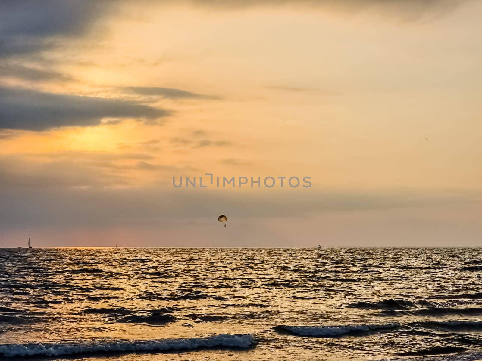 Sunset or sunrise sky clouds over sea sunlight in Phuket Thailand Amazing nature landscape seascape Colorful sky background