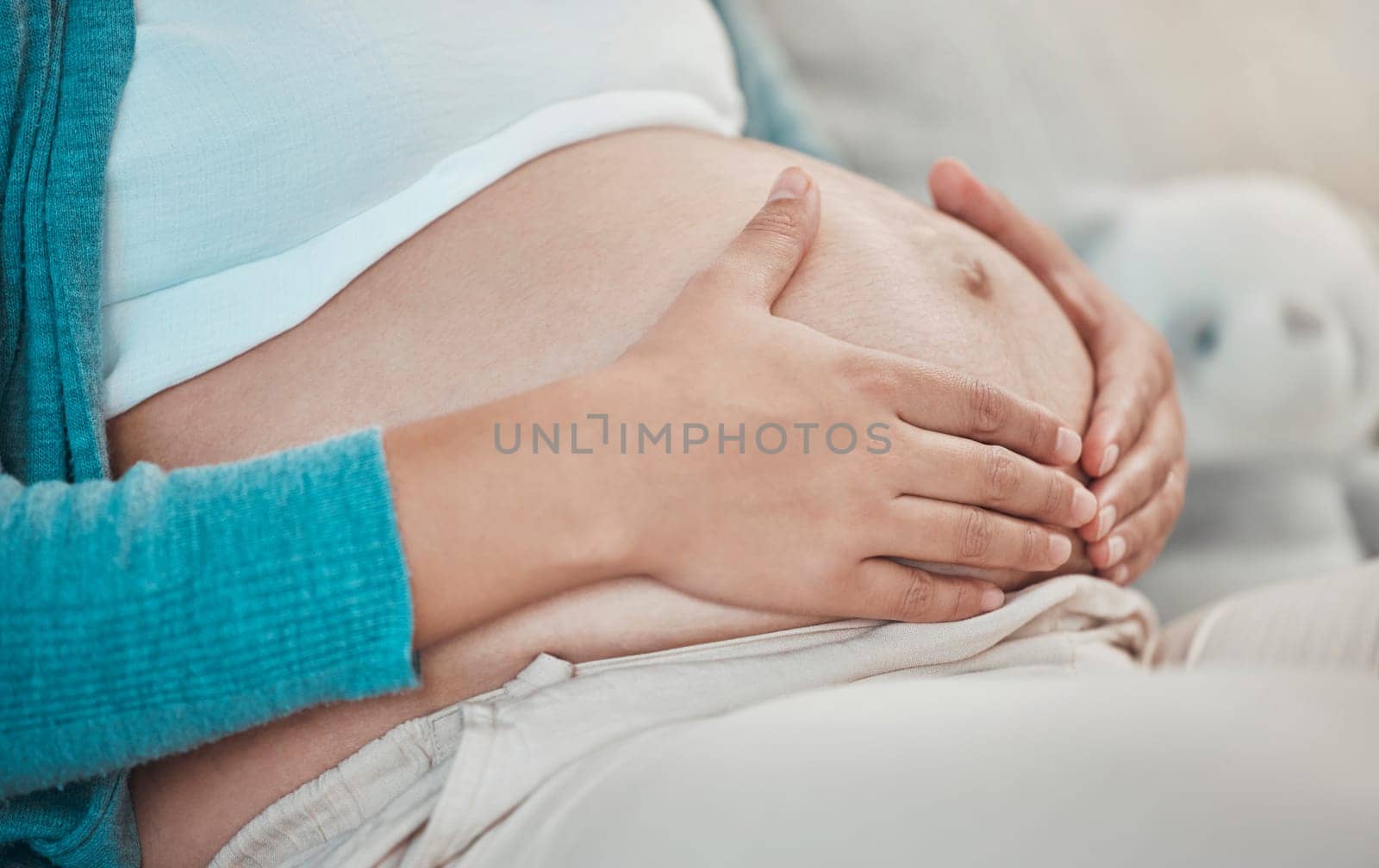 Pregnant, tummy and woman touching body to bond with her baby for maternity care with love. Bonding, pregnancy and mother touching her stomach to prepare for motherhood and being a parent.