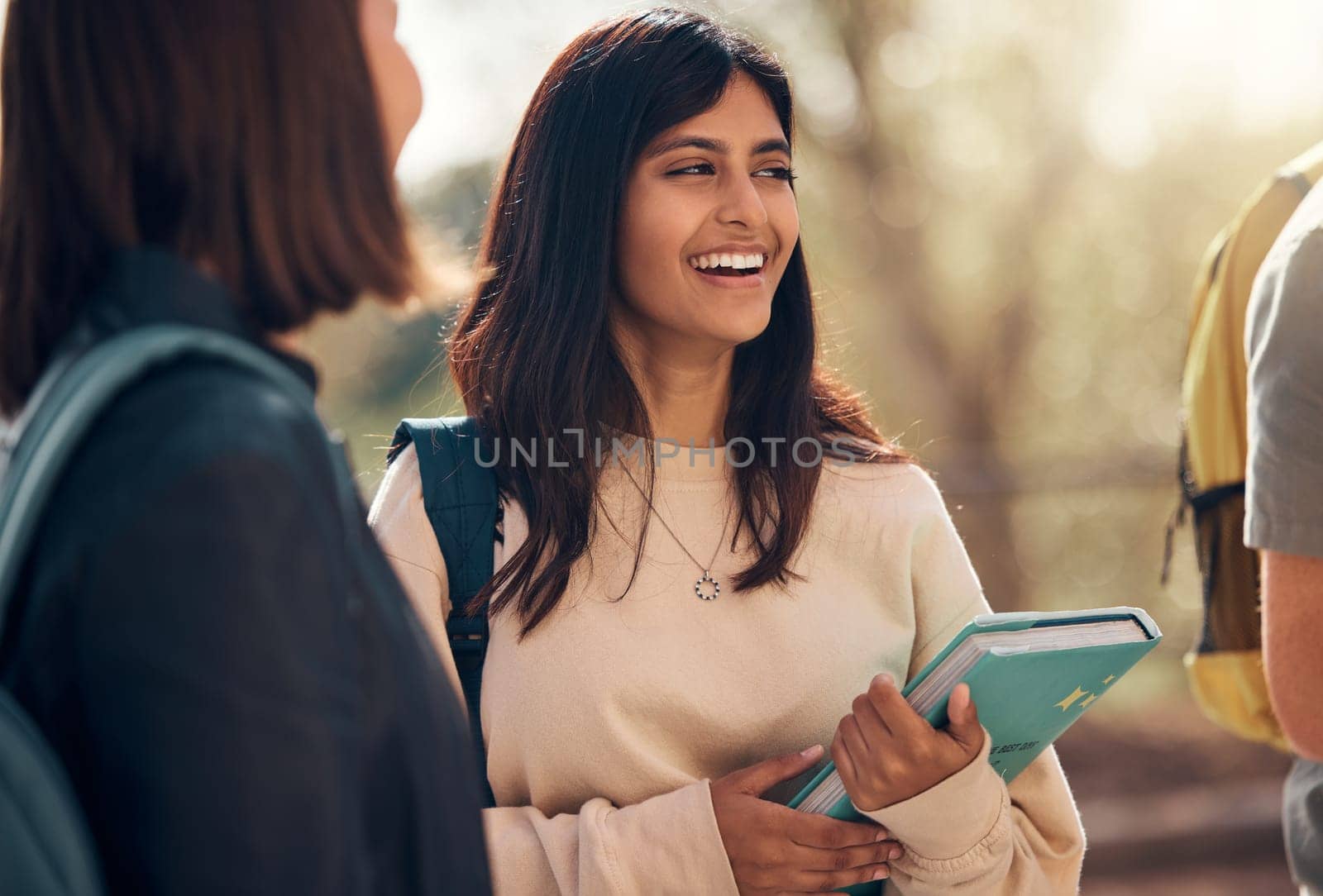 Happy, books or indian woman student with friends at school, college or university outdoor for learning, education or scholarship. Motivation, smile or group of young students for studying or academy by YuriArcurs