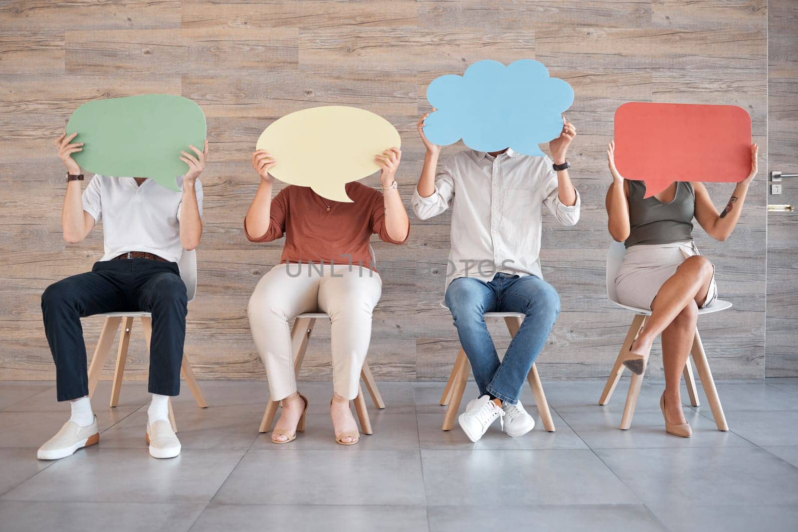 Communication, office and business people holding speech bubble and sitting on chair. Creative, mockup and group of workers with empty sign for diversity in opinion, voice and discussion in workplace.
