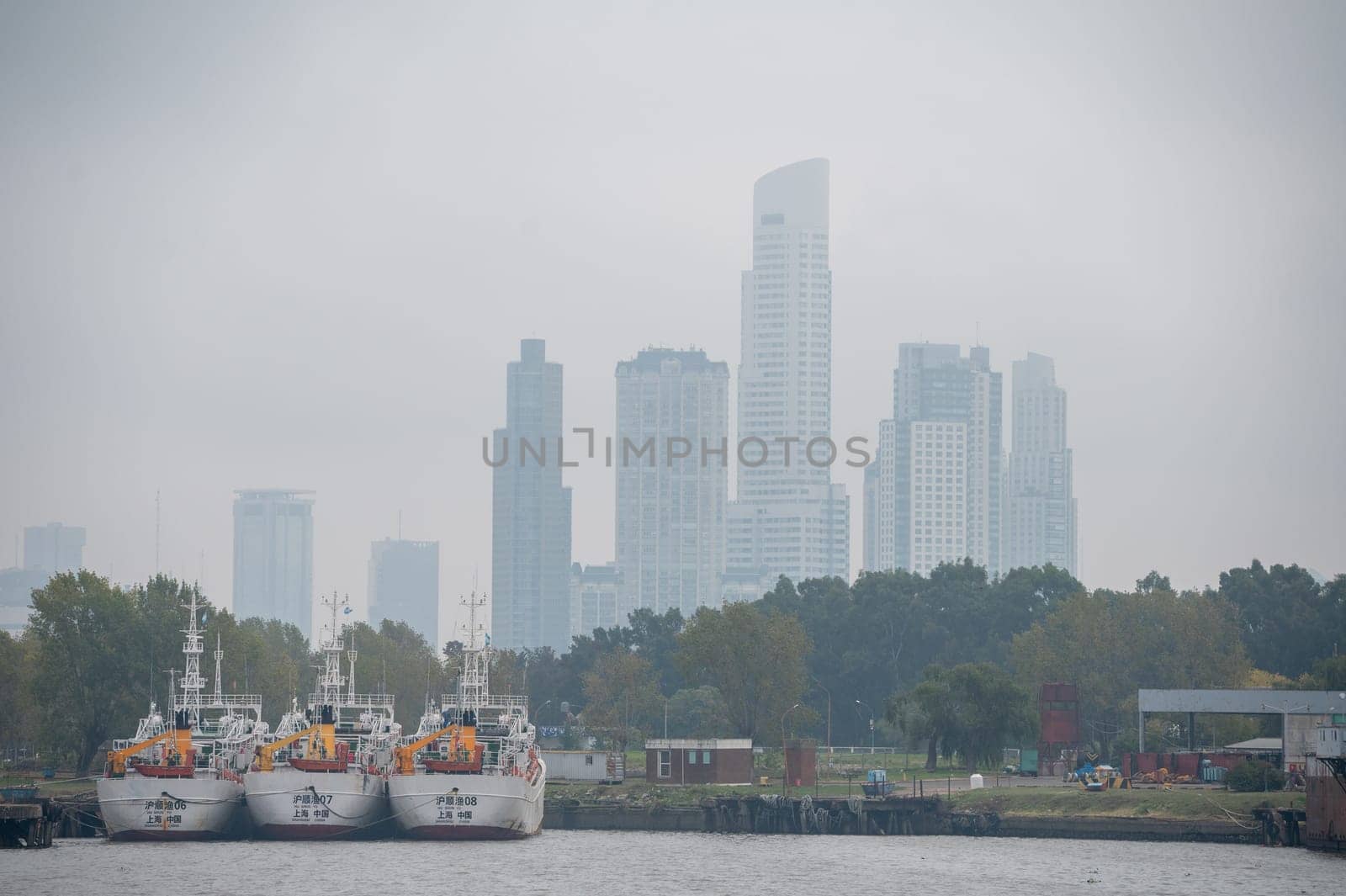 Foggy day with ships moored in the port of Buenos Aires in April 2023.